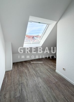 Gepflegte 2,5-Zimmer-Maisonettewohnung im Dachgeschoss mit TG-Stellplatz in Schenefeld