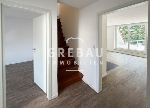 Gepflegte 2,5-Zimmer-Maisonettewohnung im Dachgeschoss mit TG-Stellplatz in Schenefeld