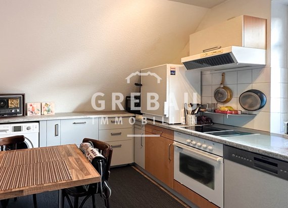 Vermietete 2-Zimmer-Wohnung im Dachgeschoss über zwei Ebenen mit TG-Stellplatz in Schenefeld
